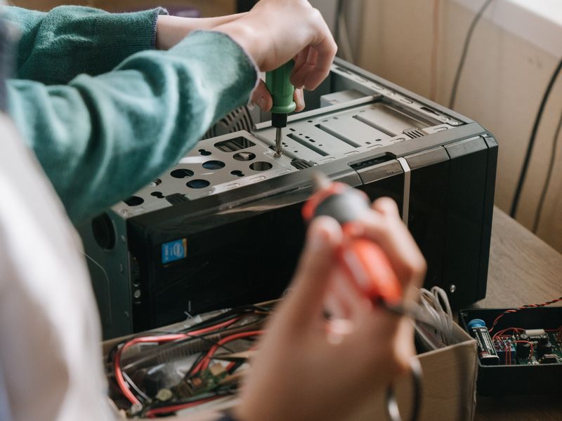 Technician repairing a computer